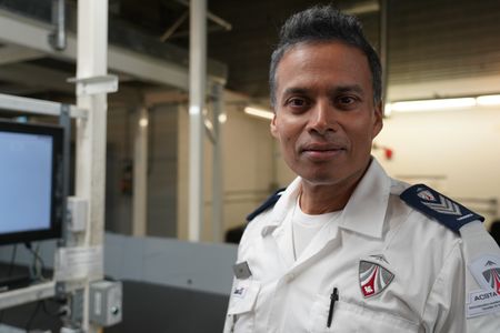 Ash Gobin, Screening Officer, CATSA, in the Baggage area. (Arrow International Media Ltd & Cantina Media)