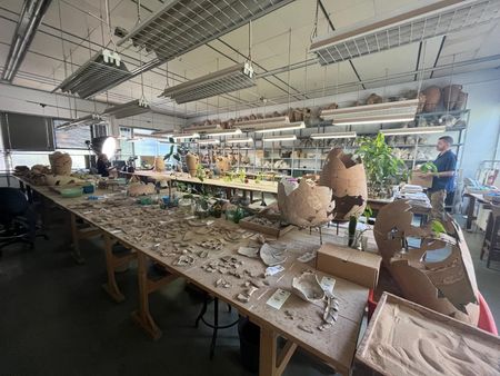 Ido Koch works in a Tel Aviv University storeroom where artifacts from Israel excavation sites are stored in Tel Aviv, Israel. (Windfall Films/Nava Mizrahi)