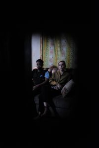 Mariana van Zeller and Shema in a safe house in Uganda. (National Geographic)