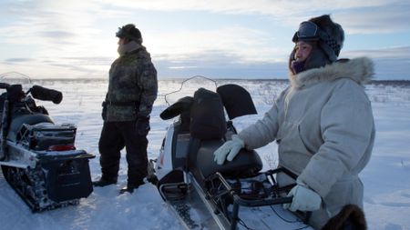 Chip and Agnes Hailstone pursue a herd of caribou for subsistence meat during the winter season. (BBC Studios/ Pedro Delbrey)