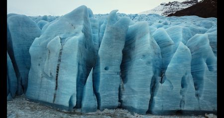 Glacial tongue descends into glacial lagoon.  (credit: National Geographic)