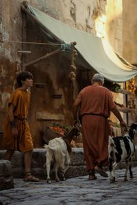 Avianius, played by Frankie Treadaway, strides home through Pompeii after his argument with Marcus Masurius. (National Geographic/Darrin Zammit Lupi)