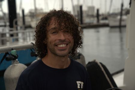 Scientist Dr. Maurits van Zinnicq Bergmann on the docks at Riviera Beach. (National Geographic/Lisa Tanner)