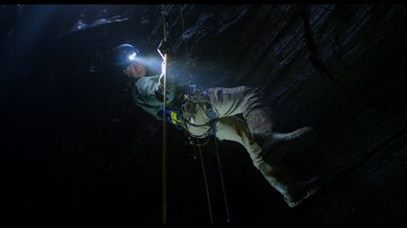 Bryan Fry  begins his Cave descent into the Cueva de los Tayos, Ecuador. (credit: National Geographic)
