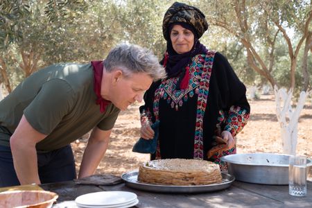 Gordon Ramsay and Firyal look at a Makmoura. (National Geographic/Justin Mandel)