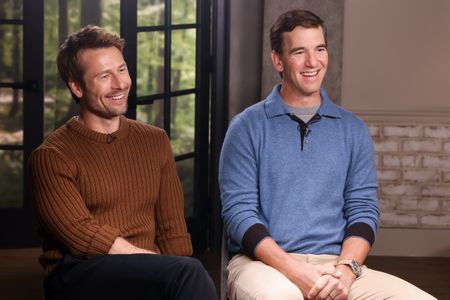 GLEN POWELL, ELI MANNING
