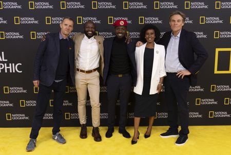 2024 TCA WINTER PRESS TOUR  - John Battsek, Moses Bwayo, Bobi Wine, Barbie Kyagulanyi, and Christopher Sharp from the “Bobi Wine: The People’s President” panel at the National Geographic presentation during the 2024 TCA Winter Press Tour at the Langham Huntington on February 8, 2024 in Pasadena, California. (National Geographic/PictureGroup)
