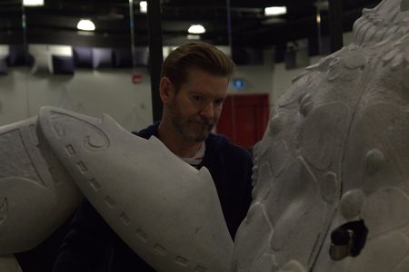 Creative director Jeff Conover inspects the Tomoatoa puppet prototype during rehearsals for "Disney the Tale of Moana" in Toronto.  (credit: National Geographic/Matt Perez)