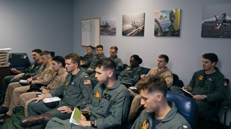 Students debrief in class at NAS Meridian. (Credit: National Geographic)