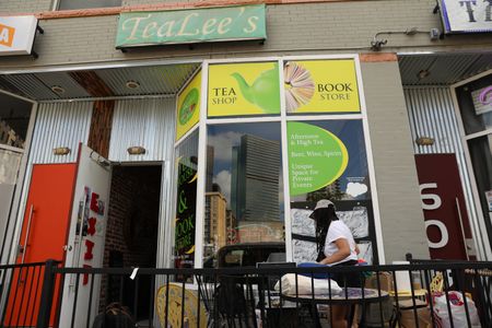 BLACK TRAVEL ACROSS AMERICA - Quaint TeaLee's tea house is located in the incredible Five Points neighborhood, a historically black-owned business district. (National Geographic for Disney/Victoria Donfor)