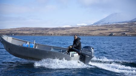 Marvin Agnot heading out on his boat. (National Geographic/Ashton Hurlburt)