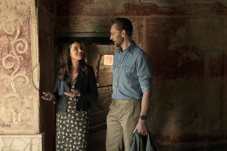 Professor Caitie Barrett and Tom Hiddleston explore the ruins of the house of Julia Felix at Pompeii. (National Geographic/Paolo Verzone)