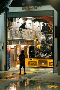 Melissa Marquez, Dave Pollock, and Pedro Afonso inside the submarine in the Sub Hanger. (National Geographic/Patrick Hopkins)