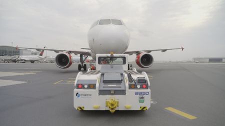 One of Air Canada's Paymover tugs pushes back a plane prior to take off. (Arrow International Media Ltd & Cantina Media)