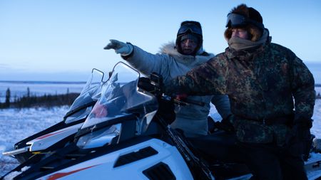 Chip and Agnes Hailstone hunt caribou while a herd migrates through their area. (BBC Studios Reality Productions, LLC/Ashton Hurlburt)