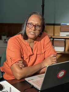 DNA Doe Project Volunteer Janel works to identify Adam Doe. (National Geographic/Venita Kidza)