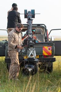 Cinematographer Mark MacEwan sets up the GSS rig. (National Geographic/Hannah Gormley)
