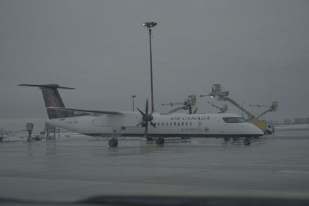 An aircraft in the Central Deicing Facility (CDF), Toronto Pearson International Airport.(Arrow International Media Ltd & Cantina Media)