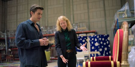 Antoni Porowski and Lucille Montagne, Head of Collections Inspection Department, discuss the furniture collection at Mobilier National. (National Geographic)