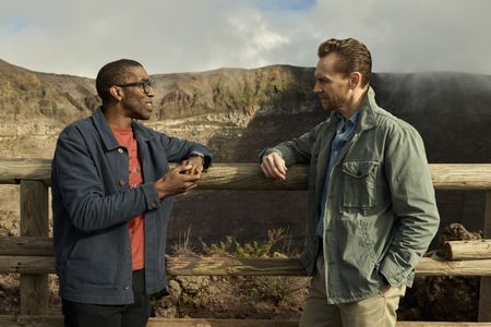 Professor Chris Jackson and Tom Hiddleston discuss the events at Pompeii from atop Mt. Vesuvius. (National Geographic/Paolo Verzone)