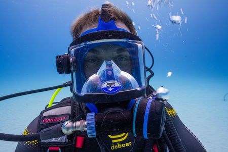 Thanks to a super flexible skeleton and their unusual, cephalofoil head, great hammerheads are the oceans masters of maneuverability. (National Geographic/Nathalie Miles)