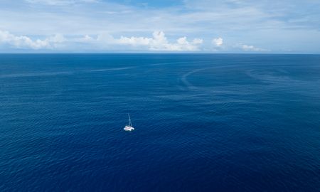 Crew boat out on the water.  (credit: National Geographic/Bertie Gregory)
