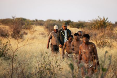 Will Smith and San Bushman Guide Kane Motswana follow the San people through the Kalahari Desert searching for food.   (credit: National Geographic/Kyle Christy)