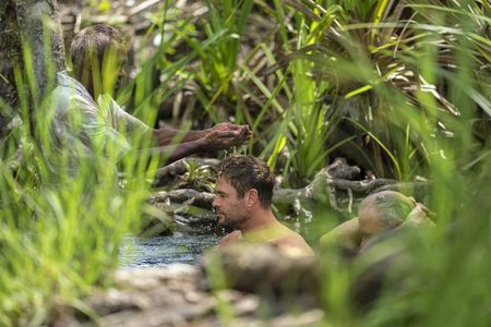 Chris and his father Craig take part in a blessing with Spencer.  The welcome is a spiritual ceremony. The significance is to let the spirits know that Chris and Craig are back.  (credit: National Geographic/Craig Parry)