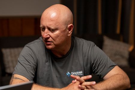 Adam Barnett in discussion. (National Geographic/Sophy Crane)
