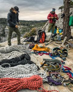 Cheyne Lempe, cinematographer, and Josh Huckaby, rigger and high angle safety specialist, double check ropes and climbing equipment while preparing to rig for the day on El Capitan. This production required the filmers to be both elite professional climbers and world class cinematographers. That meant we had a very small pool of candidates to choose from. Careful logistics planning was critical everyday for the shoot with camera crew members often deploying to several different sections of the route thousands of feet down the wall. You didn't want to end up 1200ft down the wall and find out you didn't have the right gear to anchor yourself, or worse yet, were still 200 ft short of rope to get to your shooting position.  (National Geographic/Jimmy Chin)