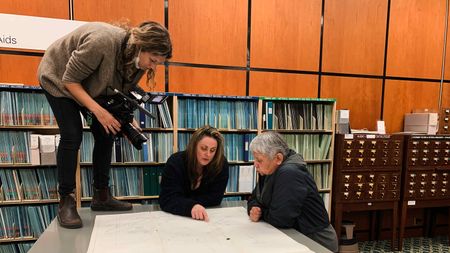 Director Emily Kassie films investigators Charlene Belleau and Whitney Spearing searching for evidence of abuse at St.Joseph's Mission. (Credit: Julian Brave NoiseCat/Sugarcane Film LLC)