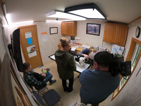 Dr. Lisa gives Luna a thorough puppy exam. (National Geographic/Bobby Falcon-Hart)