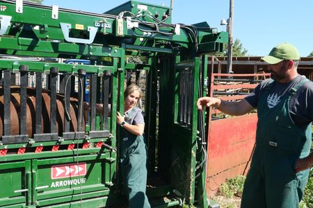 Intern Mallorie Van Tassel follows Dr. Ben Schroeder's direction as she sets up a probe used for semen sample collection. (National Geographic)