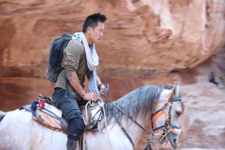 Petra, Jordan - Albert Lin on horseback at Al-Khazneh in Petra, Jordan. (National Geographic)