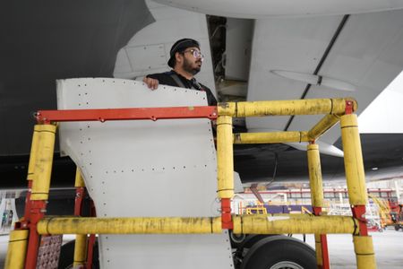 Junior Aircraft Maintenance Engineer, Air Canada, Sameer Baboolal at the Air Canada Hangar. (Arrow International Media Ltd & Cantina Media)