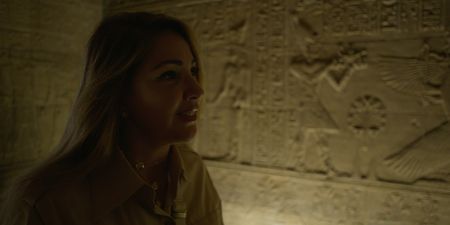 Kathleen Martinez with hieroglyphics in the background. (credit:  National Geographic)