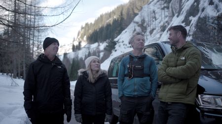 Chris Hemsworth, right, and his support team of (left to right) Robbie Maddison, Abigail Marsh, and Percy Bishton discuss the challenge. (credit: National Geographic)