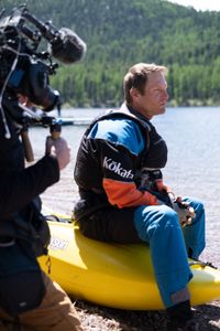 Professional kayaker Ben Stookesberry sits on his kayak and observes the water. DP Ross McDonnell films him.  (National Geographic/Harrison Gayton)