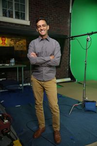 Andrew Nosal standing and smiling with arms crossed. (National Geographic/Robert Toth)