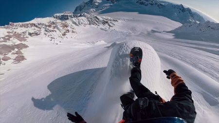 Point of view of Travis Rice as he snowboards on a mountain in Alaska.  (photo credit: Travis Rice, Inc)