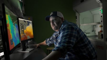 Dr. Tobey Curtis is analyzing the data from Liberty's tag in a lab at the School for Marine Science and Technology in New Bedford, MA. (National Geographic/Joseph Brunette)