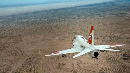 A student starts their dive at the bombing target during a training exercise. (Credit: National Geographic)