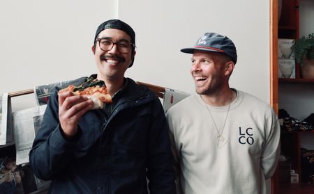 Justin Gomez eats pizza with Josey Baker at The Mill's weekly pizza party in San Francisco. Justin considers Josey an inspiration. (National Geographic/Ryan Rothmaier)