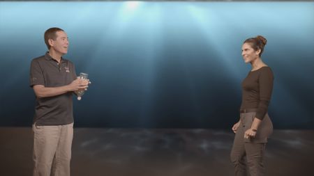 Dr. Stephen Kajiura and Dr. Diva Amon speaking in the shark studio lab. (National Geographic)