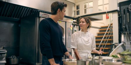 Antoni Porowski chats with Chef Elena in the kitchen at Rosetta. (National Geographic)