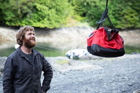 Oliver Johnson constructs a hoist on his property. (National Geographic/Lukas Taylor)