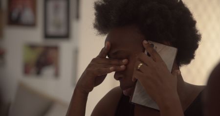 Barbie crying on the phone.  (Mandatory photo credit: Southern Films)