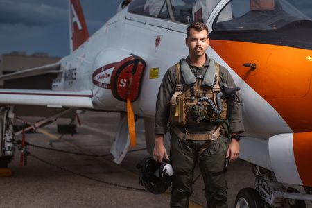 Student 1st Lt Chuck Kent poses next to a T-45. (Credit: National Geographic/Freddie Claire)
