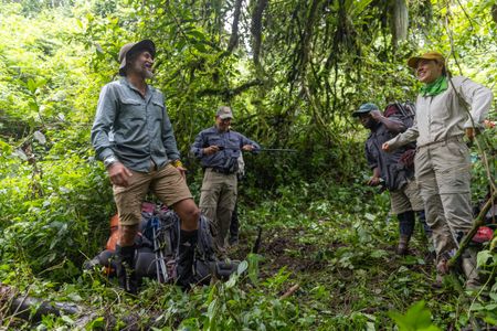 National Geographic Explorer Dr. Steve Boyes, Researcher Sabine Henry, Assistant Researcher Emmanuel Niyonkuru and Expedition Leader Johann van der Westhuizen reach the most distant source of the Nile in Nyungwe Forest National Park, Rwanda. (National Geographic/Millie Marsden)