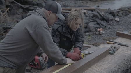 Troy Brockway and Sarah McDonald construct a ramp on their home property. (National Geographic/Gil Cano)